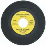 A yellow and black record with the words " golden crown " on it.