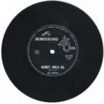 A black and white record with the words " honey, hold me ".