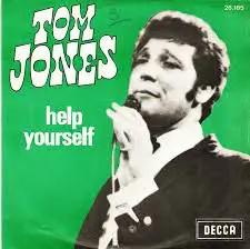 A picture of tom jones on the cover of a record.