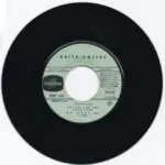 A black and white record with the label of keith collet