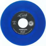 A blue record with the label " minnociceos ".