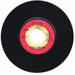 A black and red record with the words " the circle " on it.