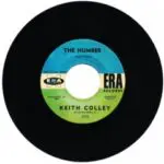 A black and white record with the words " keith colley " on it.