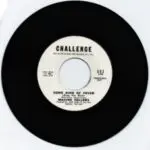 A black and white record with the words " challenge " on it.