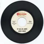 A black and white record with the words " up out my hands ".